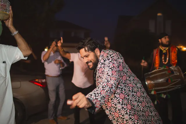 The dhol behind him.