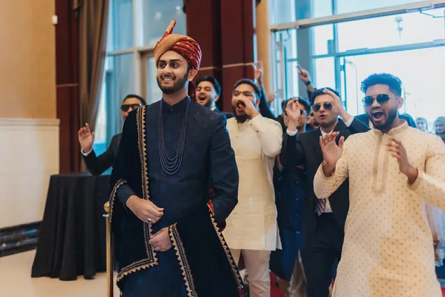 Dancing into the hall.