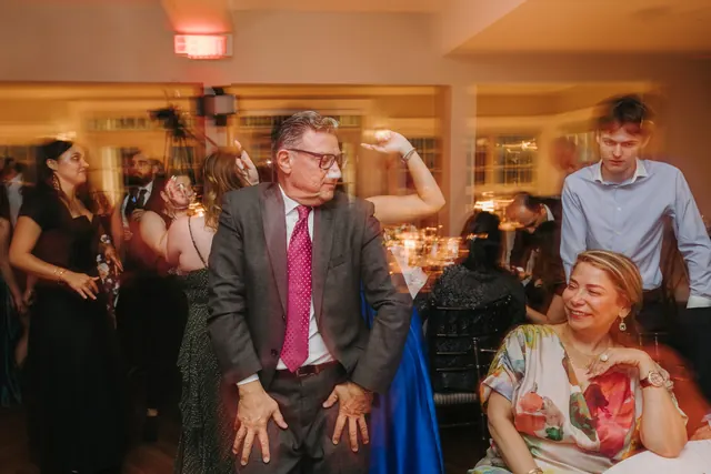 Dancing with the crowd.
