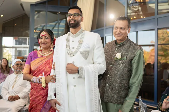 The groom, with family.