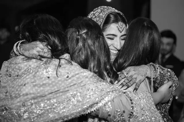 A group hug, in black and white.